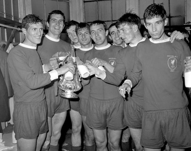 Liverpool players celebrated winning the 1965FA Cup with a bottle of milk each in the changing room after the match: (l-r) Wilf Stevenson, Ron Yeats, Chris Lawler, Roger Hunt, Peter Thompson, Gerry Byrne, Tommy Smith, Geoff Strong