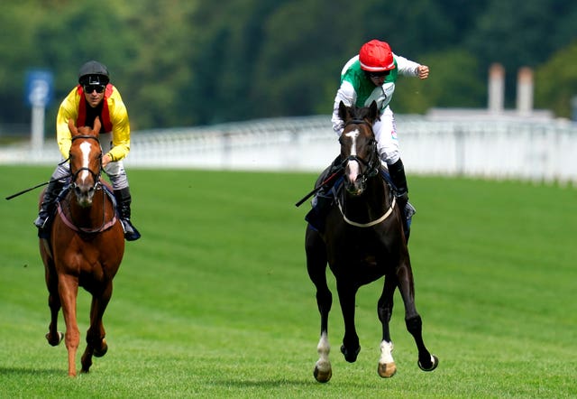 Jockey PJ McDonald (right) celebrates on Pyledriver after winning the King George VI And Queen Elizabeth Qipco Stakes at Ascot 