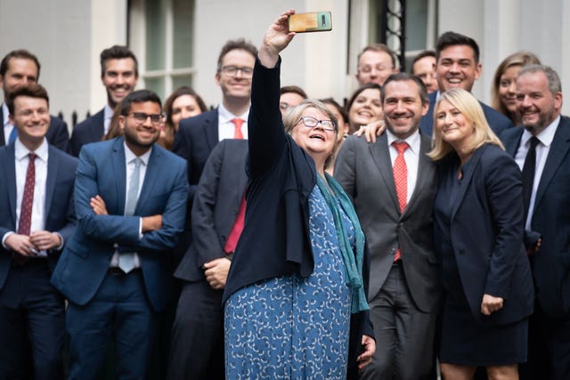Therese Coffey takes a selfie in Downing Street on her last day as deputy prime minister (Stefan Rousseau/PA)