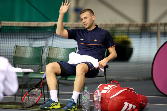 Dan Evans celebrates beating Ed Corrie in his first match following his drugs ban