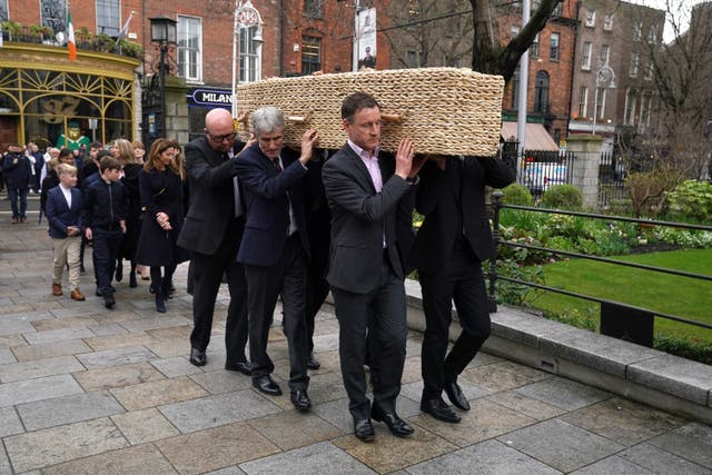 The coffin of Charlie Bird arrives for a service at Mansion House in Dublin to celebrate the life of the former RTE correspondent who died on Monday