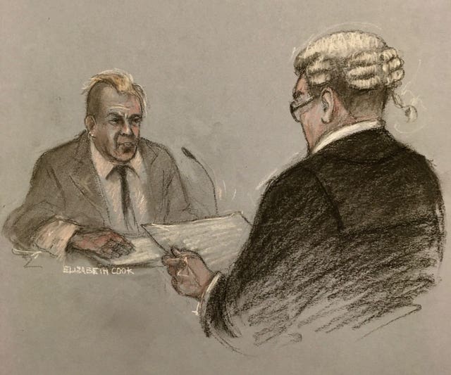 Court artist sketch of John Lydon giving evidence to barrister Edmund Cullen QC during the hearing 