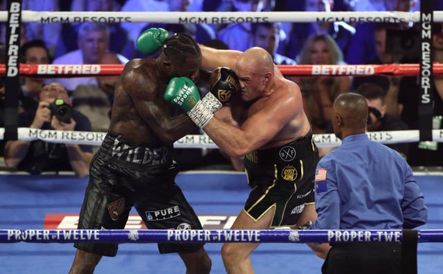 Tyson Fury, right, and Deontay Wilder fight for a third time on Saturday night (Bradley Collyer/PA)