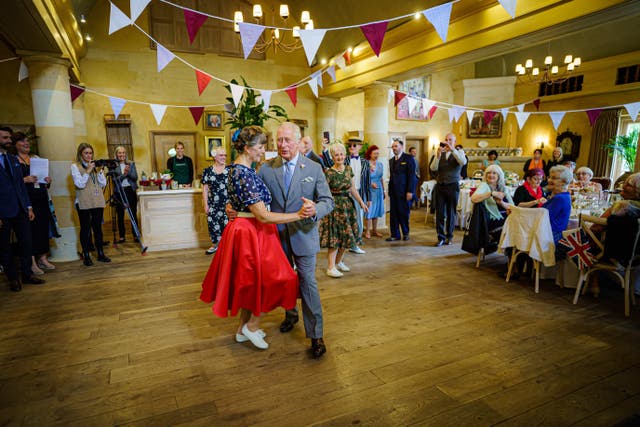 The Prince of Wales dancing during a Jubilee tea dance to mark the Platinum Jubilee, at Highgrove near Tetbury, Gloucestershire, in 2022 