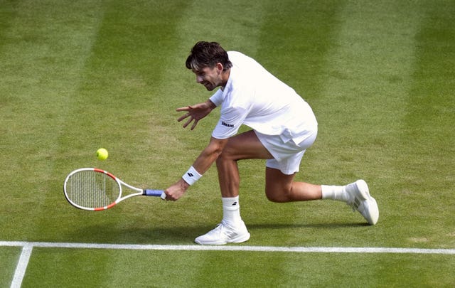 Cameron Norrie hits a backhand