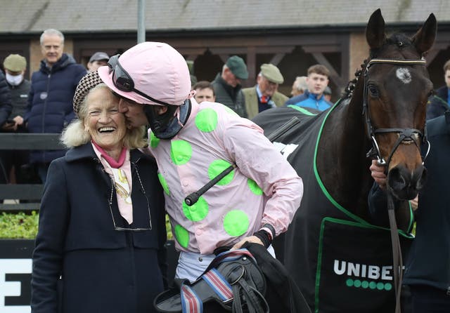Jockey Patrick Mullins kisses his late grandmother Maureen Mullins 
