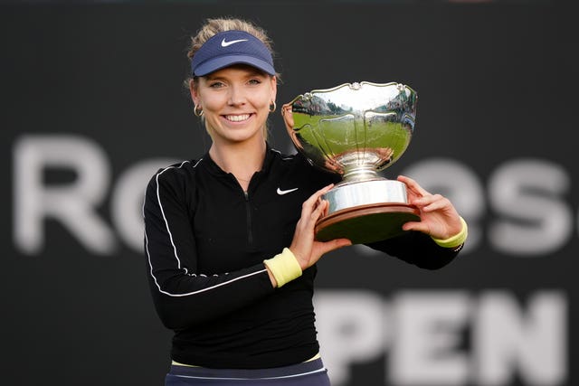 Katie Boulter holds a trophy