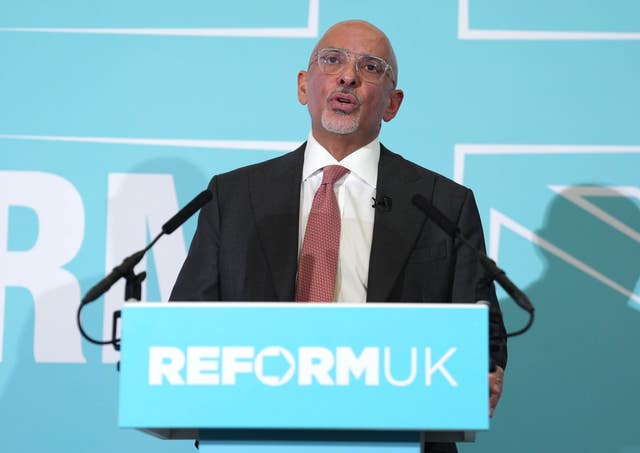 Nadhim Zahawi speaking from behind a Reform UK lectern