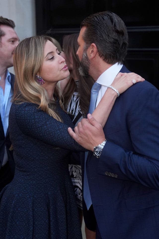 Holly Valance kisses Donald Trump Jr farewell as he leaves the fundraiser  for his father in London 