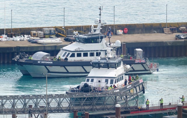 A group of people thought to be migrants are brought into Dover, Kent, from Border Force vessels following small boat incidents in the Channel