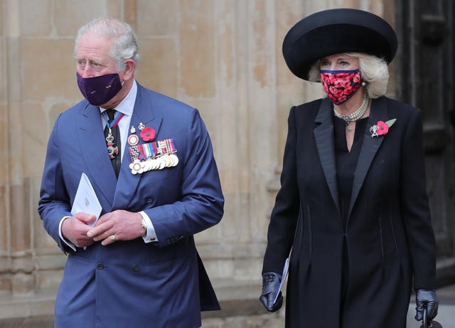 Charles and Camilla wore facemasks during the service like the rest of the congregation. Aaron Chown/PA Wire