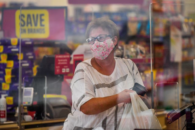 People in Wales must now wear face coverings in shops (Ben Birchall/PA)
