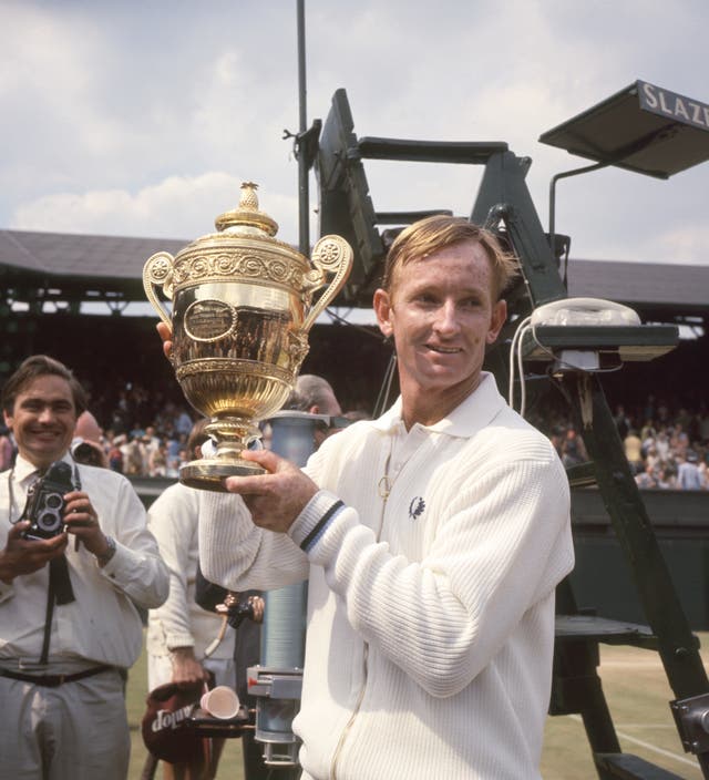 Rod Laver marks his return to Wimbledon with the trophy