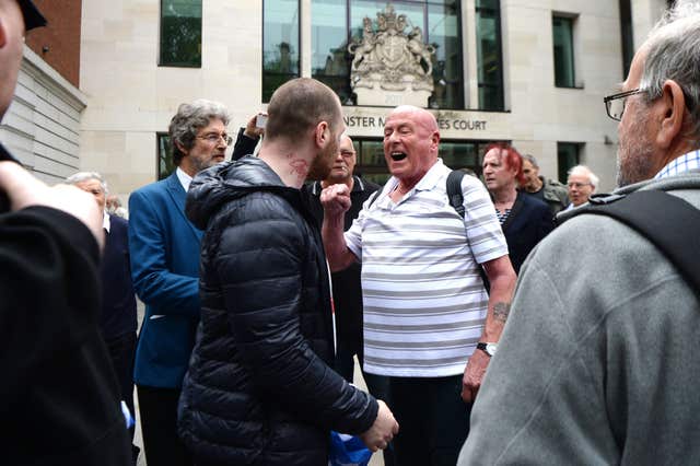 Arguments ensue outside Westminster Magistrates’ Court amid the Alison Chabloz court case (Victoria Jones/PA)