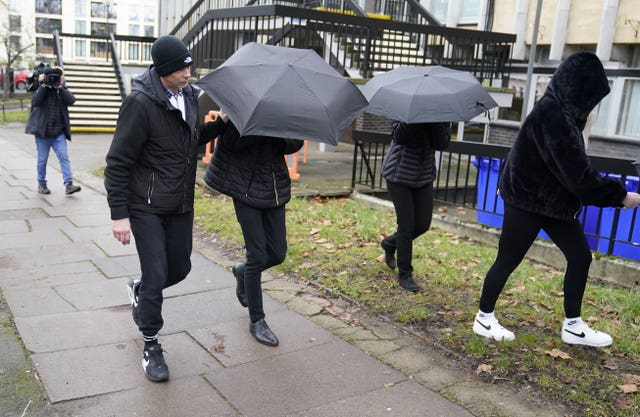 Elliot Benham, 25, and Sophie Harvey, 25, leave a court hearing (Ben Birchall/PA)