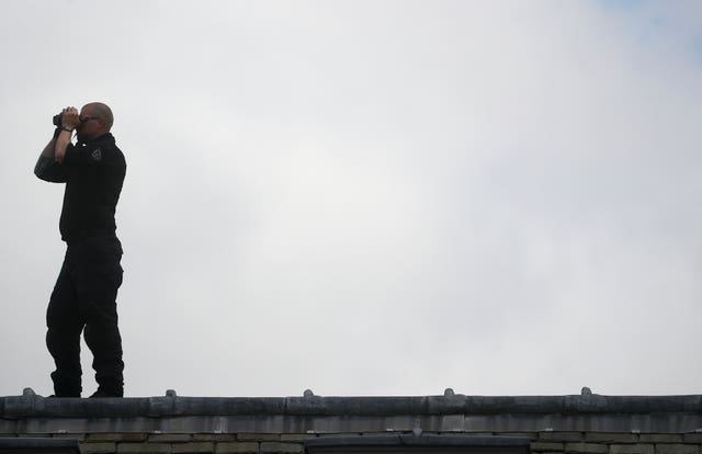 A security officer keeps watch at the Palace of Westminster