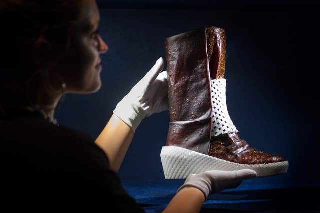 A boot made for life on Mars, which is made of fungus and human sweat