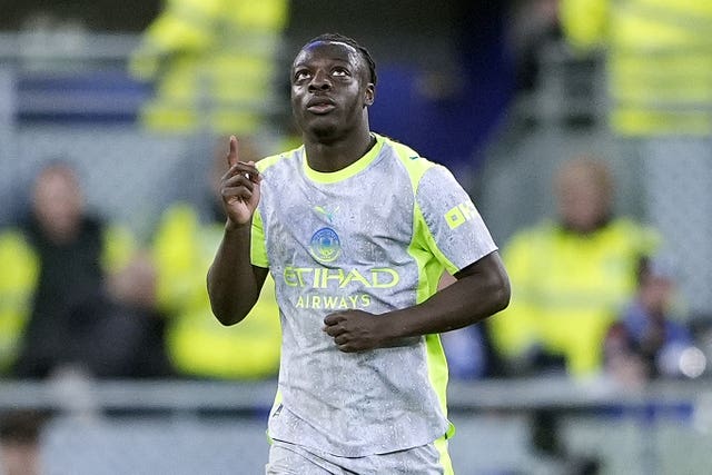 Manchester City’s Jeremy Doku celebrates scoring against Everton