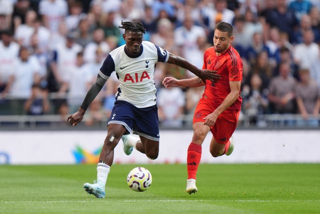 Yves Bissouma shields the ball from Jamal Musiala during Tottenham's friendly with Bayern Munich