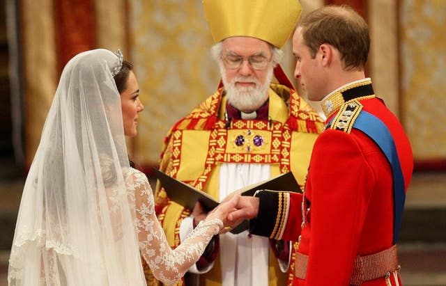 Prince William and Kate Middleton take their vows during their wedding at Westminster Abbey (Dave Thompson/PA)
