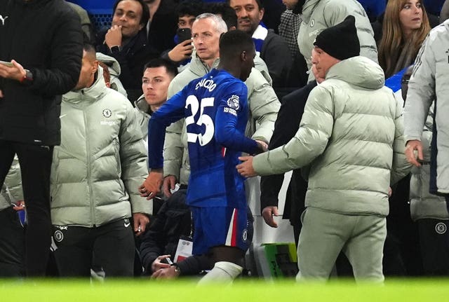 Chelsea’s Moises Caicedo walks off the field after being sent off against Arsenal