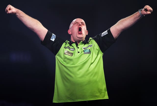 World number one Michael van Gerwen, pictured, edged out Joe Cullen in the last round (Kieran Cleeves/PA)