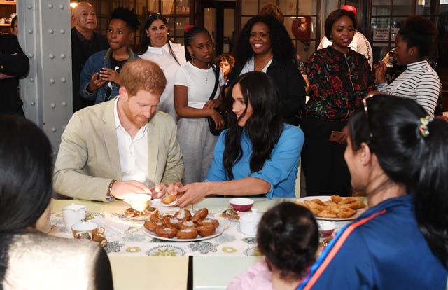 The Duke and Duchess of Sussex during a visit to the District Six Homecoming Centre in Cape Town, South Africa