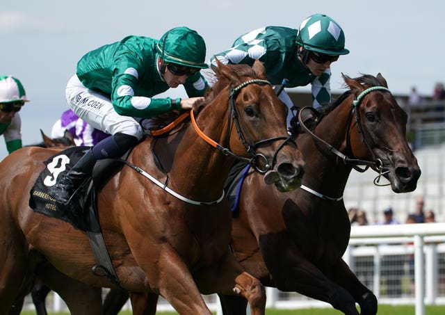 Ladies Church (near side) is in action for Johnny Murtagh