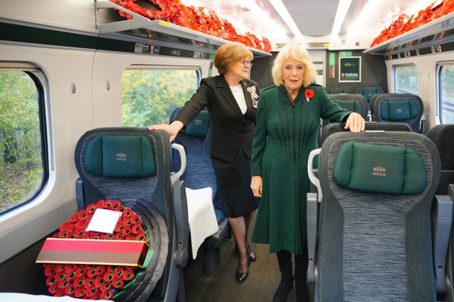 The Queen travels by train from Chippenham in Wiltshire to London Paddington, as part of the Great Western Railway &lsquo;Poppies to Paddington&rsquo; event
