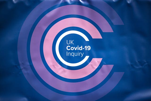 The UK Covid-19 Inquiry logo on a banner