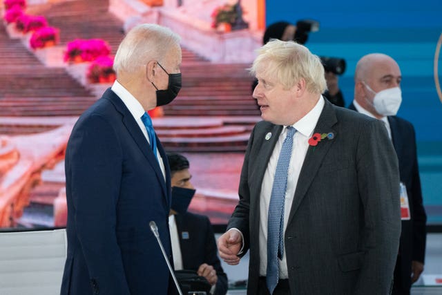 US President Joe Biden, pictured with Boris Johnson during the G20 summit in Rome, has looked to resolve trade disputes since coming to office