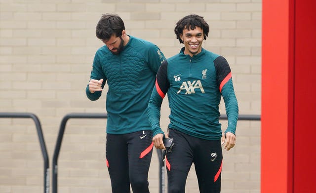 Trent Alexander-Arnold (right) and goalkeeper Alisson