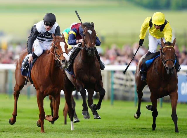 Ramatuelle (left) in action in the 1000 Guineas 