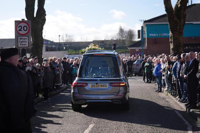 The funeral cortege for Brendan ‘Bik’ McFarlane outside his family home on Cliftonville Road, Belfast