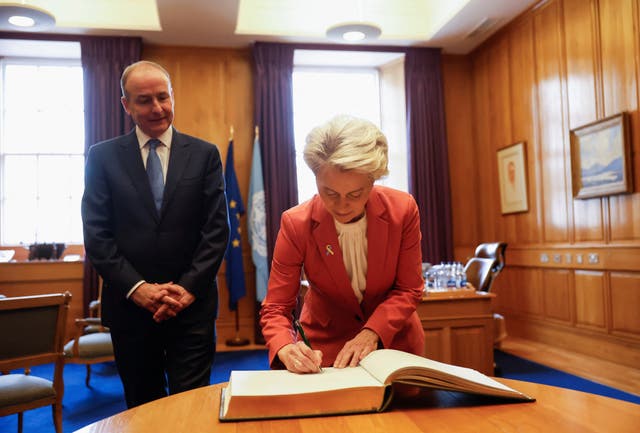 European Commission president Ursula von der Leyen signs a visitors' book at Government Buildings in Dublin