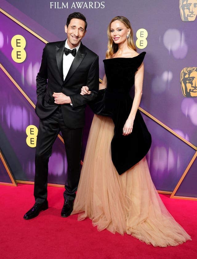 Adrien Brody and Georgina Chapman attending the 78th British Academy Film Awards at the Royal Festival Hall, Southbank Centre, London
