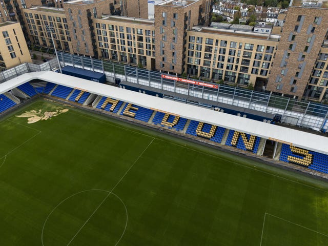 Drone shot of the Cherry Red Records Stadium in Wimbledon, London after there was a sinkhole on the pitch caused by flooding