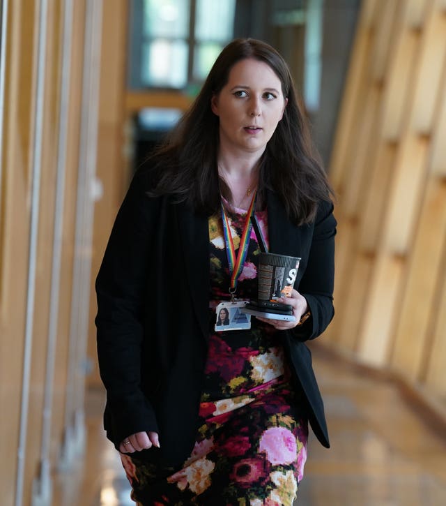 Emma Roddick walks through Holyrood corridor