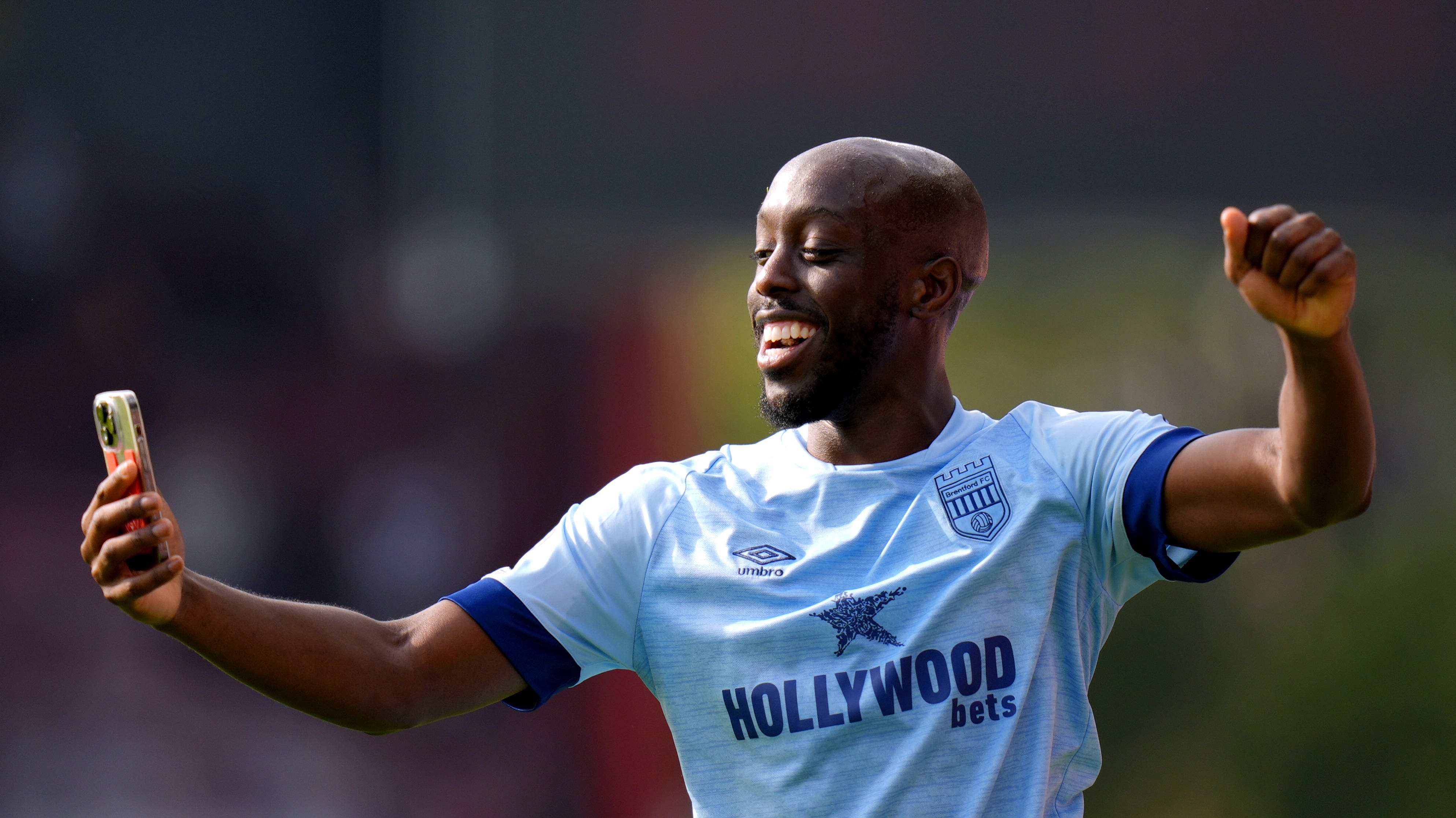 Brentford’s Yoane Wissa films a video on a phone at the end of the game (Andrew Matthews/PA)