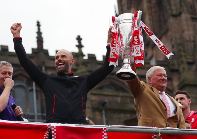 Tony Stewart, right, celebrates Rotherham's promotion to the Championship in 2018