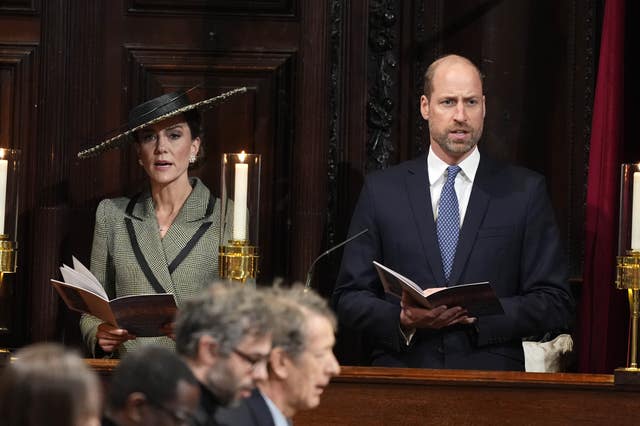 The prince and princess joining the congregation in singing during the service 