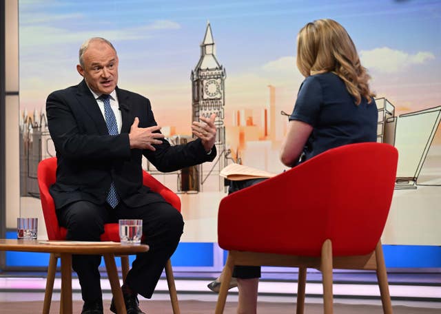 Sir Ed Davey speaking while seated in a TV studio opposite Laura Kuenssberg