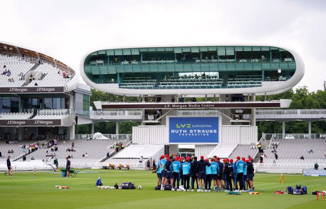 England players have a team huddle on the pitch at Lord's 