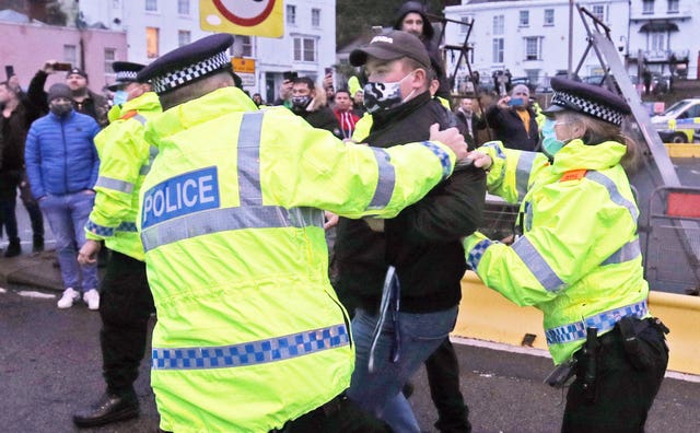 Police hold back drivers trying to enter the Port of Dover in Kent a(Steve Parsons/PA)