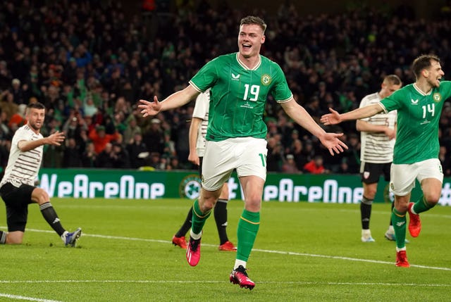 Republic of Ireland’s Evan Ferguson celebrates scoring against Latvia (Brian Lawless/PA)