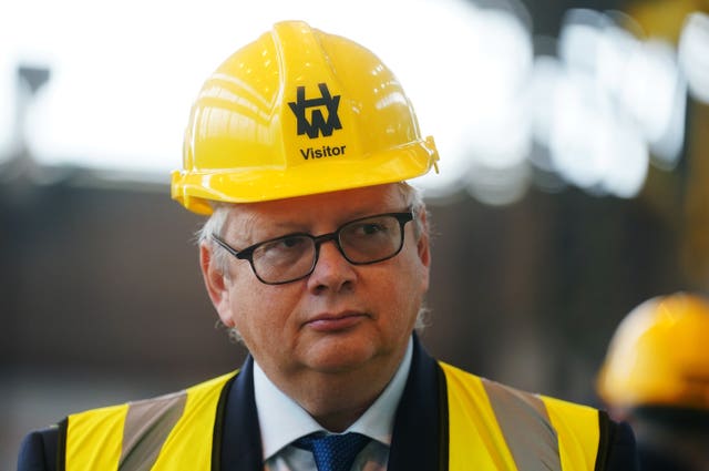 John Wood in a yellow hardhat