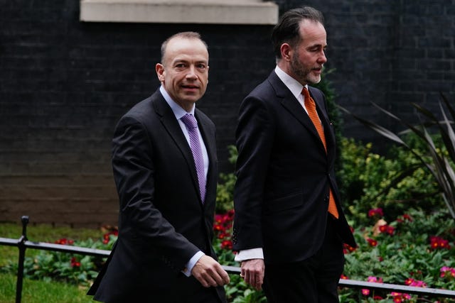 Chris Pincher (right) with chief whip Chris Heaton-Harris leave Downing Street following their appointment in February