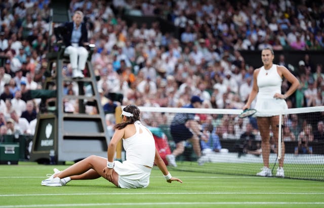 Emma Raducanu slips during her match against Aryna Sabalenka