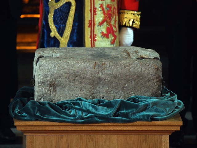 Stone of Destiny sitting on a wooden platform