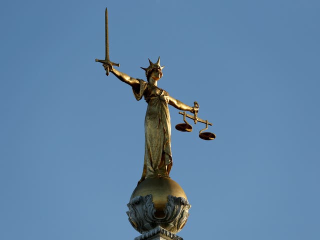 FW Pomeroy’s Statue of Justice stands atop the Central Criminal Court building, Old Bailey